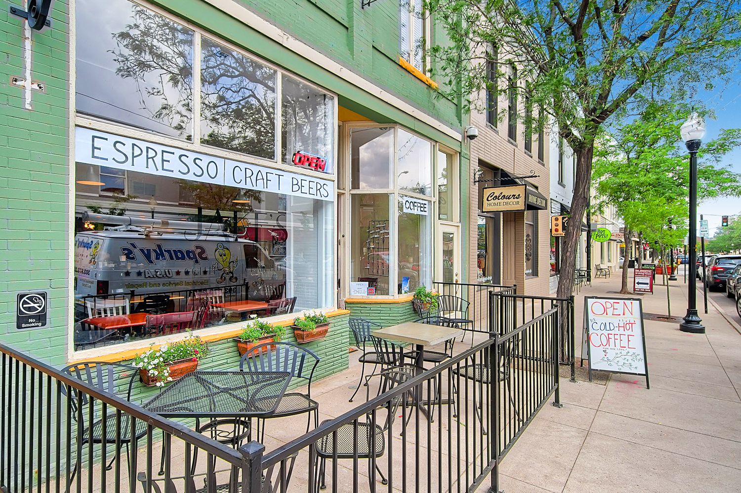 Downtown littleton, colorado street with coffee shop and brewery